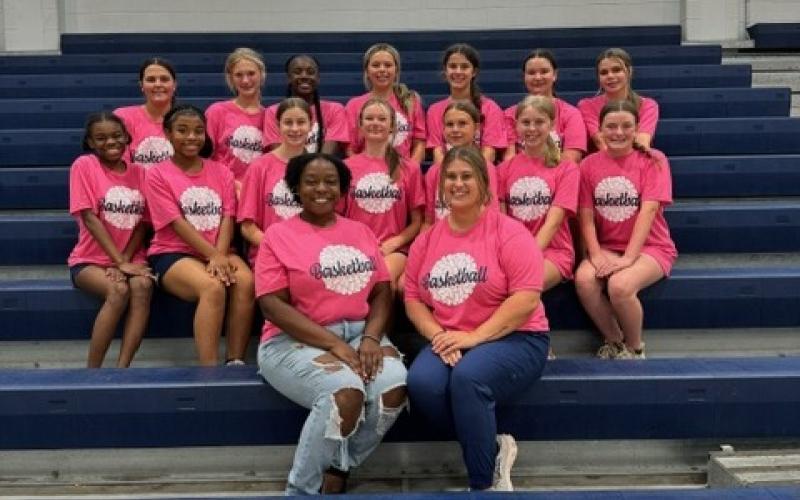 The ECMS basketball cheerleading squad includes (front row, L-R) Coaches Tanesha Oliver and Meagan Klein, (middle row, L-R) Jaray Harris, Malaya Hearn, Kinsley Mewborne, Ella Fleming, Bella Powell, Alyssa Hunt and Lizzy Sigman and (back row, L-R) Ashley Sanders, Sidney Gailey, Daniya Little, Isabella Adams, Camdyn Kurtz, Isabella Todd and Kimberly Sanders.(Photo submitted by Jamie Keblish)