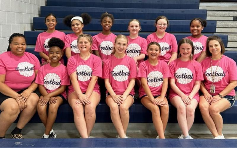 The ECMS football cheerleading squad includes (front row, L-R) Coach Dishae Blackwell, Myla Hood, Matylee Brown, Liberty Rousey, Presley Bellew, Sequoia Singleton and Coach Jamie Keblish and (back row, L-R) Jolee Ainsworth, Surrender Goings, Kenjia Davis, Piper New, Claire Moon, and Charity Oglesby. (Photo submitted by Jamie Keblish