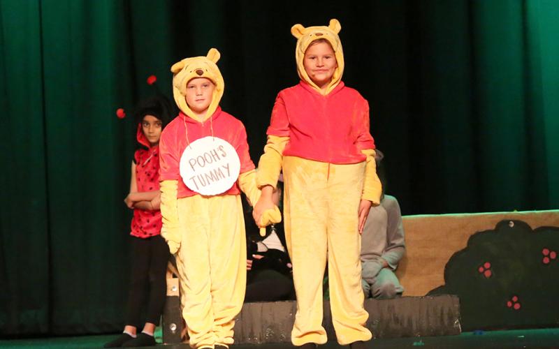 Pooh (Madden Turner) and Pooh’s Tummy (Vivian Walker) perform   “The Tummy Song.” (Photo by Wells)