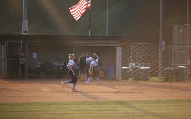 Aria Mobley fields the ball and prepares to throw to first. (Photo by Wells)
