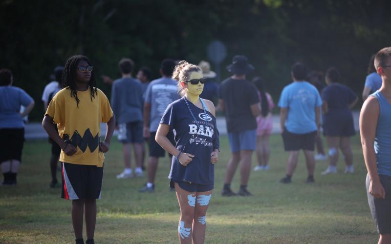 Kinsley Anders shows her school spirit with face pant, beads and an Elbert County shirt during the Blue Devil Band’s annual band camp July 16. (Photo by Wells)