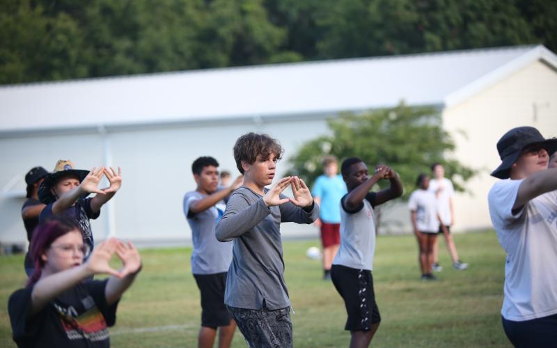 Jibril Engelhardt marches in formation during the Blue Devil Band’s annual band camp July 16. (Photo by Wells)