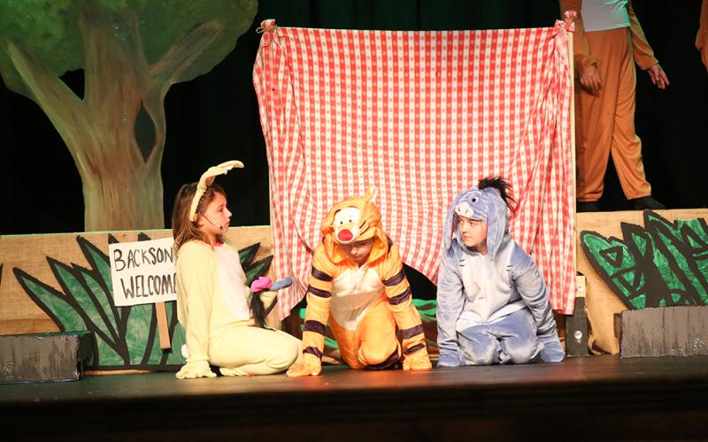 During “All in the Trap,” Lilyana Thompson, Rease McElroy and Cally Easom discuss how they will get out of the trap. (Photo by Wells)