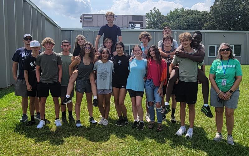 The 2024 Devil and Lady Devil Cross Country teams include Ezra Adamson, Eli Alexander, Brody Baker, Michael Beahringer, Landon Bowman, Devisha Desai, Mason Dove, Kinsley Duke, Ava Dunbrack, Samuel Gailey, Linda Garcia, MaKaylie Harris, Alexandra House, Anthony Linares, Colton Mabry, Yamilet Martinez, Grant Owens, Kennedy Ray, Ronny Medellin, Rilee Rucker, Brantley Smith, Dakota Toole, Samantha Walsky and Mitchell Wheeler. (Photo submitted by Kyle Ashworth)