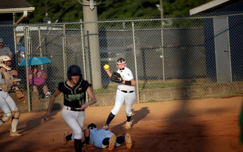 Ansley Harris looks to first base as she gets ready to throw a batter out during the win over Franklin. (Photo by Wells)