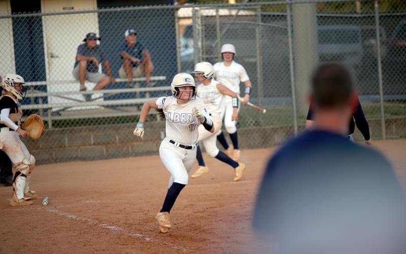 Hannah Brady sprints towards first base after laying down a bunt. (Photo by Wells)