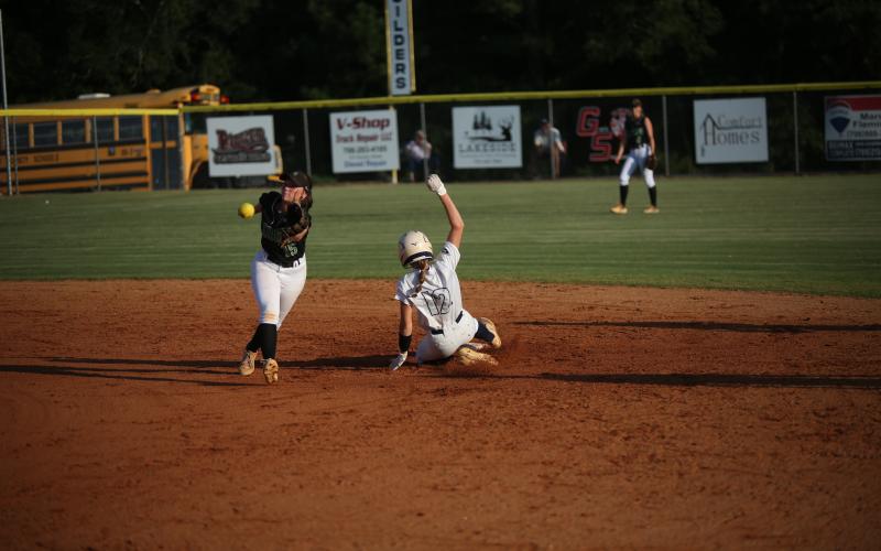 Emily Booth slides safely into second base after stealing a base. (Photo by Wells)