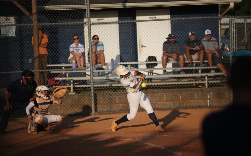 Ky Dubose puts the ball in play during the game against Franklin. (Photo by Wells)