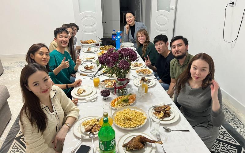Anna’s friends Talghat and Meruert host Anna for a traditional Thanksgiving dinner in their home. (Photo submitted by Anna Kubas)