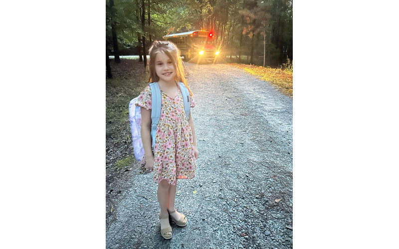 Third grader Gabby Ray is ready to start the new school year as she waits for the bus to take her to Elberton Elementary.  "I was a little nervous, but my first day was great. My teacher is very fun and nice, and my classroom is cool-looking. My favorite part of the day was getting on the bus to see my friends," Gabby said. (Photo submitted by Kristy McCannon)