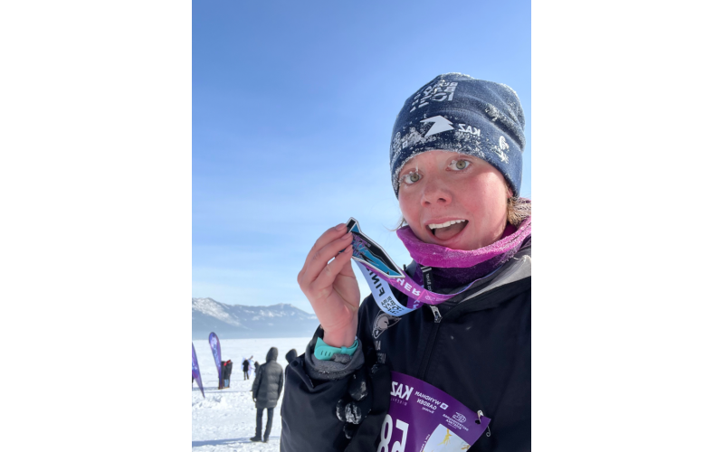 Anna displays her race hardware after completing the half marathon on the frozen Burabay Lake. (Photo submitted by Anna Kubas)