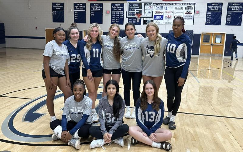 The Lady Devils volleyball team poses for a picture after picking up a 2-0 win over Washington-Wilkes. Aug. 20.