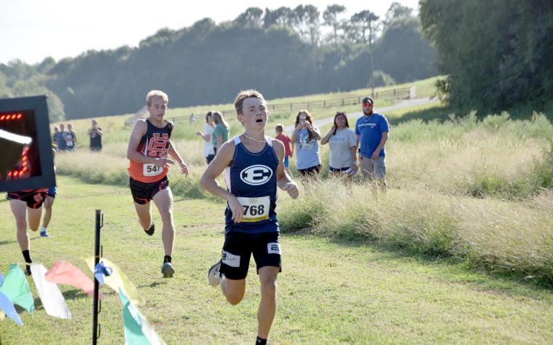 Dakota Toole crosses the finish line in third place overall during the Bill Woods Pridelands High School Invitational Sept. 7. (Photo by Shane Scoggins - Franklin County Citizen)