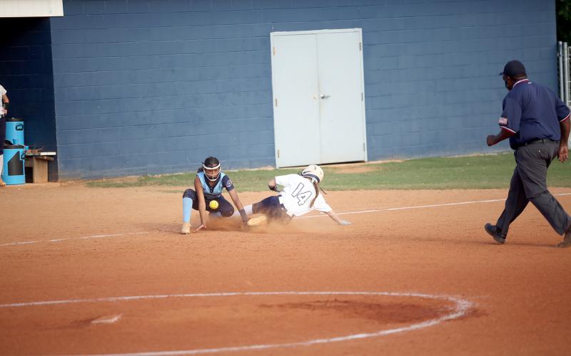 Miller Drake slides into third base after hitting a triple against Providence Christian Sept. 5. Drake finished with two runs and an RBI in Elbert’s region win over Oglethorpe Sept. 10.  (File photo by Wells)