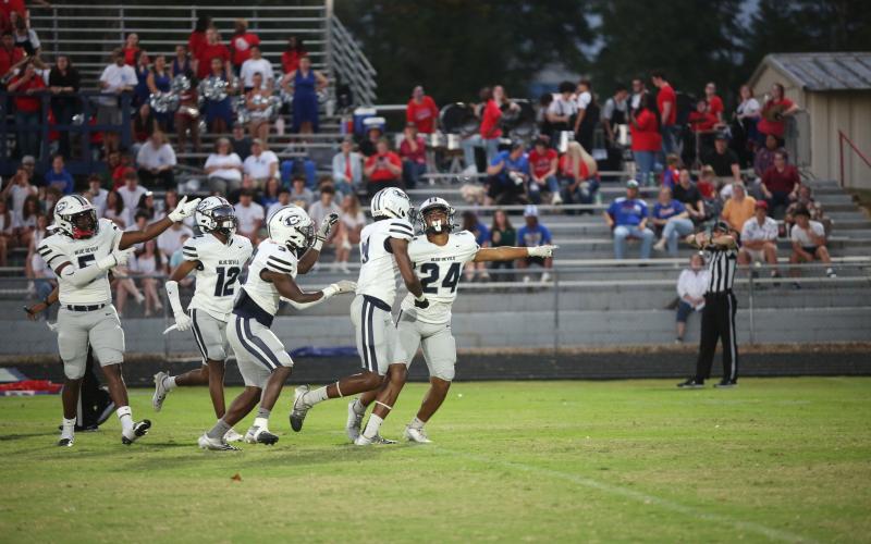 No. 24 Jose Rodriguez signals that it’s Elbert County ball after intercepting an Oglethorpe pass and returning it 44-yards to set up an Elbert touchdown. (Photo by Wells)