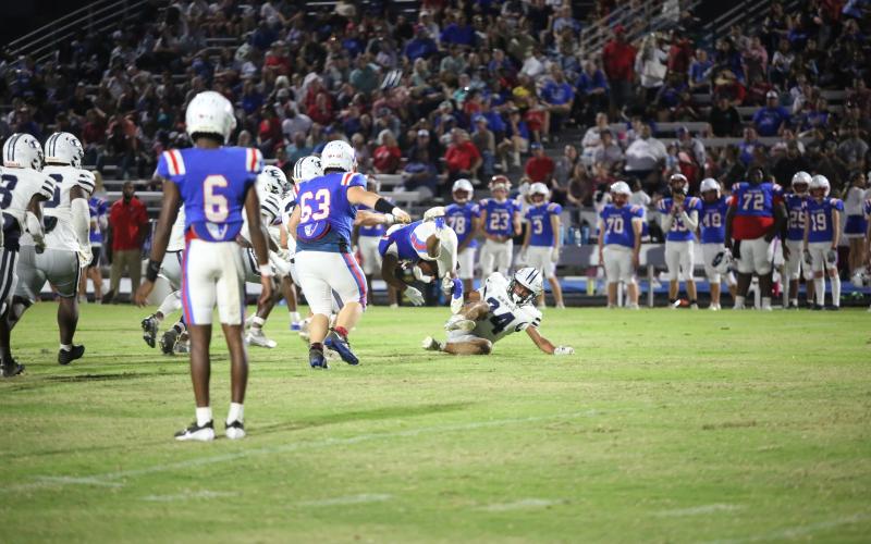 Jose Rodriguez trips up a Patriot ball carrier in the backfield during Elbert County’s 46-13 win over Oglethorpe. (Photo by Wells)
