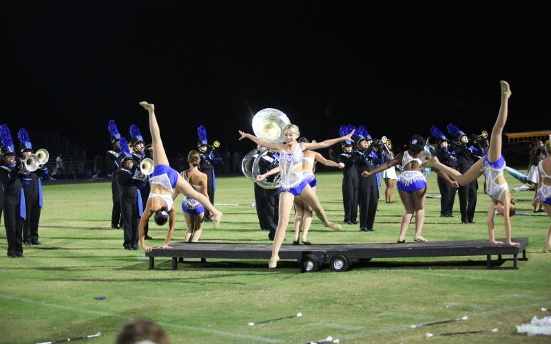 The Lady Devil majorettes dismount from a platform in style during the Blue Devil Band’s performance after Elbert’s win over Oglethorpe. (Photo by Wells)