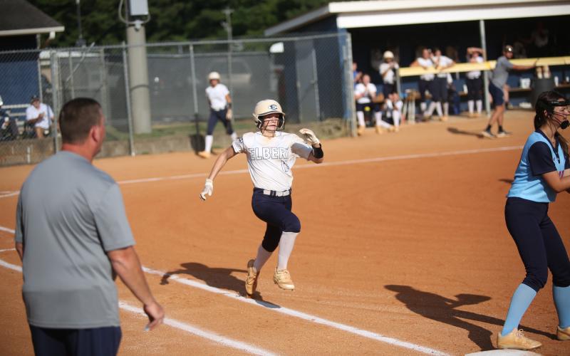 Emily Booth sprints towards first base during the game against Providence Christian Sept. 5. (Photo by Wells)
