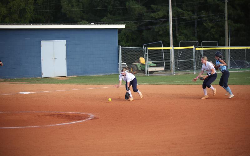 Ansley Harris charges down a ground ball during the game against Providence Christian. (Photo by Wells)