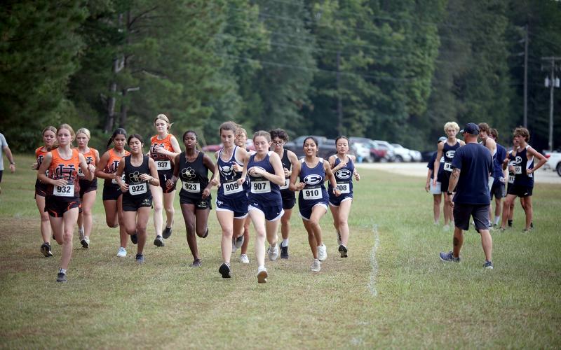The female runners kick off the first-ever Granite City Invitational varsity girls race at Camp Harmony Sept. 24. The Lady Devils finished with a pair of runners on the podium while the Devils finished second overall. (Photo by Wells)