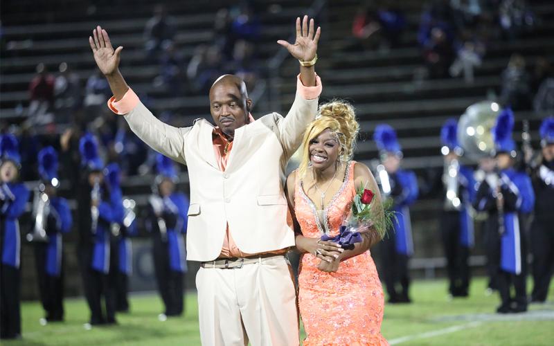 Rob Robinson and daughter Heaven Robinson celebrate upon hearing Heaven's name being called as the 2024 ECCHS Homecoming queen. (Photo by Wells)