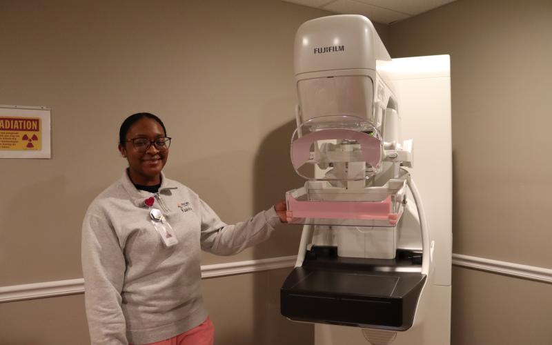 Mammography technician Alayjah Sammons shows the new Fuji Cristalle mammography machine at Elbert Memorial Hospital. (Photo by Weeks)