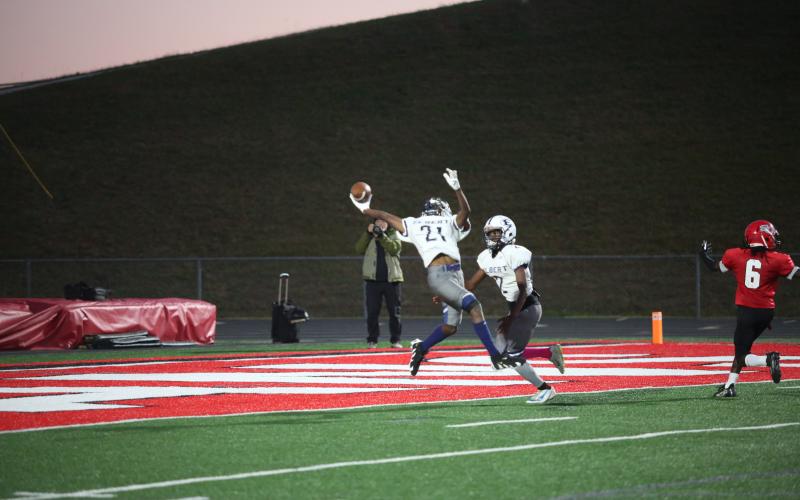 Avery Newman makes a spectacular one-handed interception during the second-half of the game against Stephens. (Photo by Wells)
