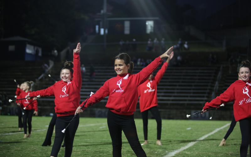 Vada Walker performs with L3 Baton during the Blue Devil Band’s pregame show Oct. 18. (Photo by Wells)