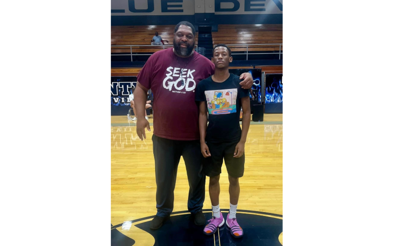 Blue Devils Head Coach Ed Geth poses with slam dunk contest winner Jordan Morrison. (Photo courtesy of Elbert County True Blue)