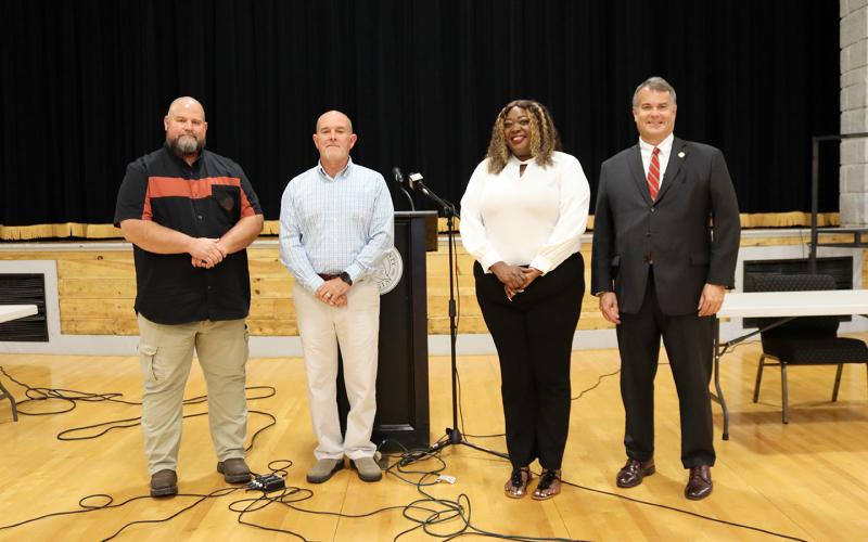 (L-R) Sheriff candidates Jamie Callaway (R) and Darren Scarborough (D) stand with District 123 candidates Hope Beard (D) and Rob Leverett (R) prior to the  2024 Candidate Forum sponsored by WSGC Radio and The Elberton Star. (Photo by Weeks)