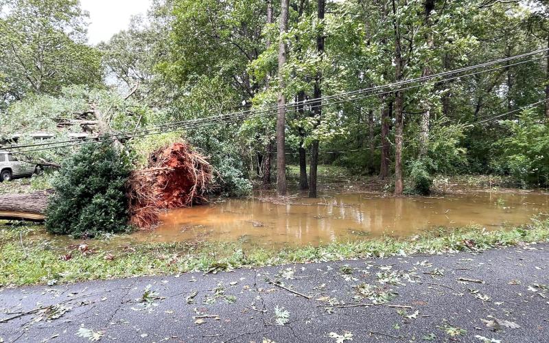 Standing water, downed power lines and fallen trees created issues for crews trying to restore power to neighborhoods across Elbert County. (Photo courtesy of Elbert County Emergency Services)