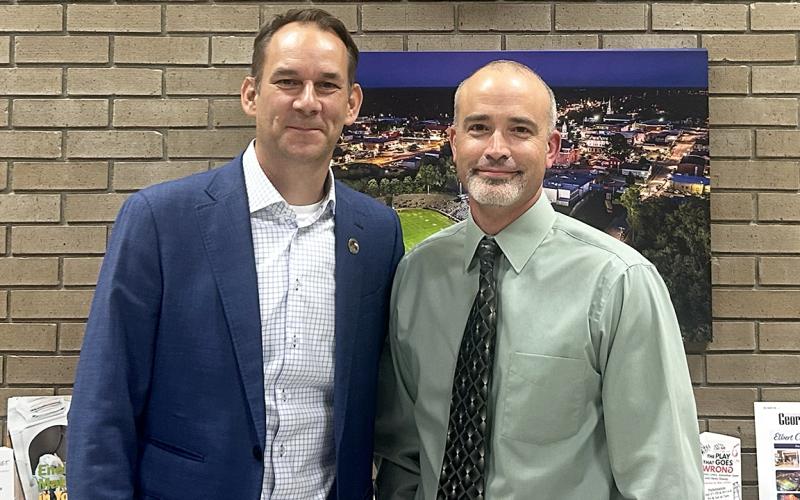 Elberton Mayor Daniel Graves and Kevin Eavenson meet outside the city council meeting after the council voted Eavenson as sole finalist for the city manager position. (Photo by Mark Wells)