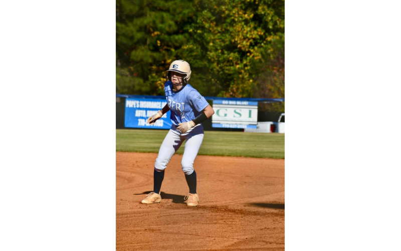 Emily Booth rounds first base and looks to the catcher during Elbert’s second-round playoff series.