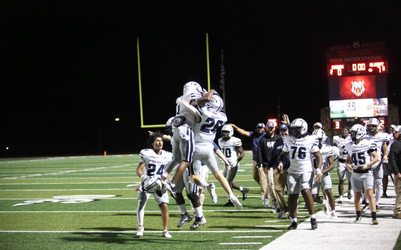 No. 1 Ty’Rikis Jones and No. 26 Colson Brown celebrate after Jones scored a receiving touchdown against Rabun County Nov. 1. (Photo by Bethany Booth - Elbert County True Blue)