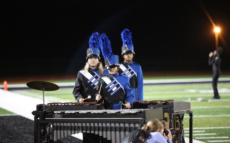 Reece Dowell, Landon Allen and Aby Ponce-Carreon perform as percussionists during the Blue Devil Band’s halftime performance. (Photo by Bethany Booth - Elbert County True Blue)