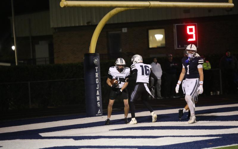 No. 17 Carter Webb celebrates with No. 16 Jackson Black after scoring a 34-yard touchdown in the first-round win over Gordon Lee. (Photo by Wells)