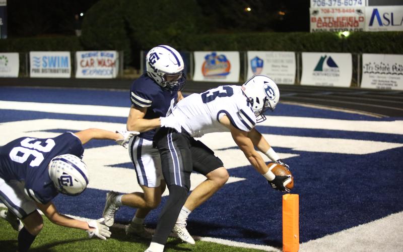 Brady Dickerson reaches the ball inside the pylon to seal Elbert County’s 28-13 win over Gordon Lee Nov. 15 in the first round of the GHSA State Playoffs. Dickerson led Elbert’s receiving corps with six catches for 79 yards and two touchdowns. (Photo by Wells)
