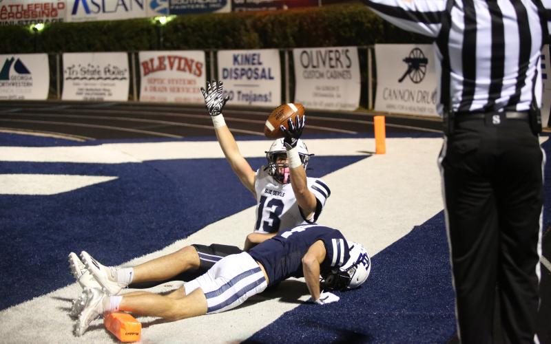 No. 13 Brady Dickerson looks for the referee’s signal after scoring the game-sealing touchdown with just over three minutes left in Elbert’s 28-13 win over Gordon Lee Nov. 15. (Photo by Wells)
