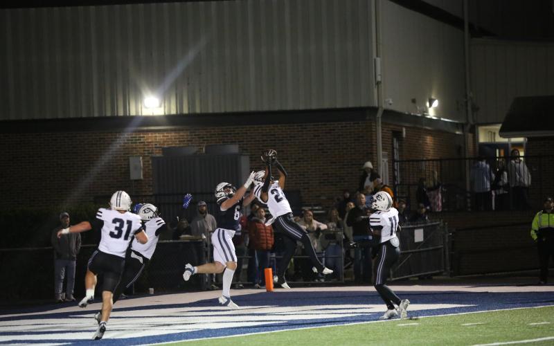 Defensive back Jose Rodriguez makes a leaping interception in his own end zone to prevent a Gordon Lee touchdown late in Elbert County’s 28-13 win over the Trojans. (Photo by Wells)