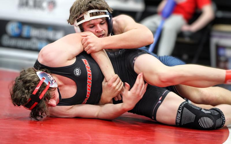 Brycin Hughes controls his opponent’s arm during the Panther Invitational Dec. 7. (Photo courtesy of April Dixon Hughes and Blue Devil Wrestling)