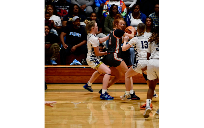 Audrey Lunsford and Sarah Blackmon turn up the pressure on defense during Elbert’s win over Hart Dec. 14. (Photo courtesy of Elbert County True Blue)