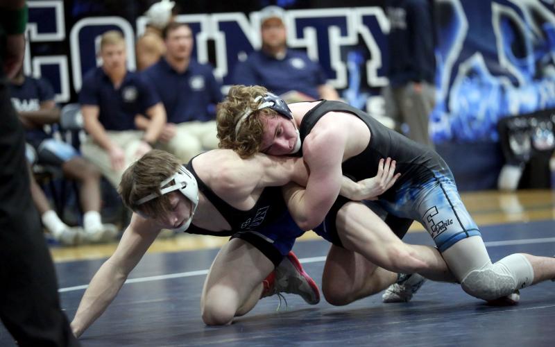 Sawyer West traps his opponent’s arm during the Area 8A Championship Duals hosted in the Inferno Jan. 9. (File photo by Wells)