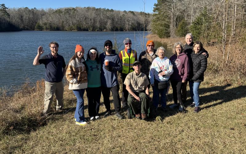 Local hikers kicked off the new year at Richard B. Russell's annual New Year's Hike. The hike is part of a state-wide initiative which encourages local residents to participate in hiking each Jan. 1. Park Naturalist Alex Dye (center) organized this year's hike. Hikers from across the state took part. (Photo by Evans)
