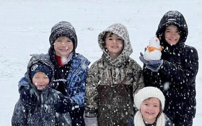 Gracin, Rhett, Hayden, Maddie and Mike Williams are armed with snowballs and snowmen. (Photo submitted by Katelin Williams)