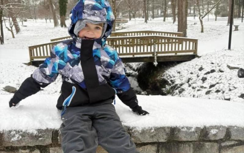 Zander Lee on the bridge overlooking the walking trail on Oak Street. (Photo submitted by Susan Lee)