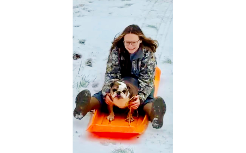 Josie Yeargin sledding with her dog, Oakley. (Photo submitted by Kim Yeargin)