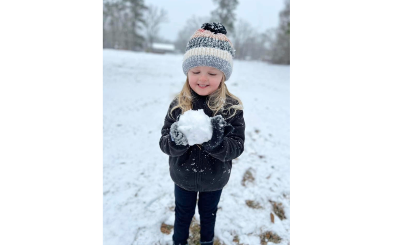 Caroline Sanders is happy to be making a snowman in Dewy Rose. (Photo submitted by Kimberly Sanders)