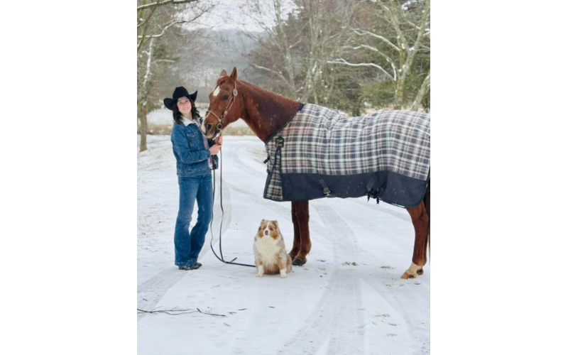 Ava Dunbrack and her furry friends enjoy the winter setting. (Photo submitted by Kristy Dunbrack)