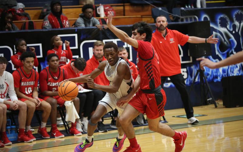 Jordan Morrison slashes to the basket during Elbert’s game against Madison County in the Inferno Dec. 7. (File photo by Wells)
