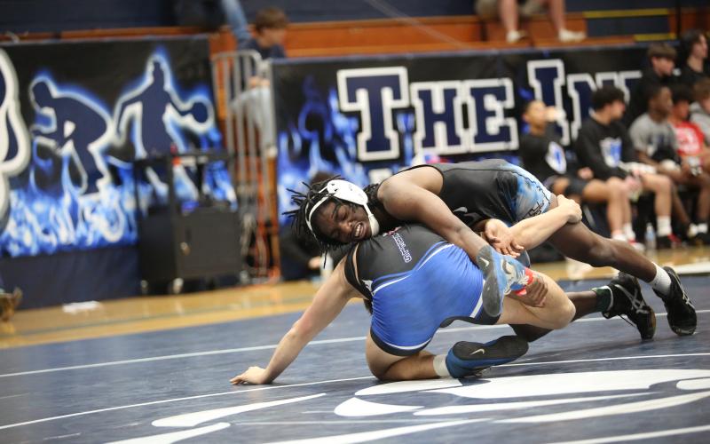 Javares Bowman tries to flip his opponent on his back to set up a pin during Elbert's match against Fannin County in the first round of the Area 8A Championship Duals in the Inferno Jan. 9. (Photo by Wells)